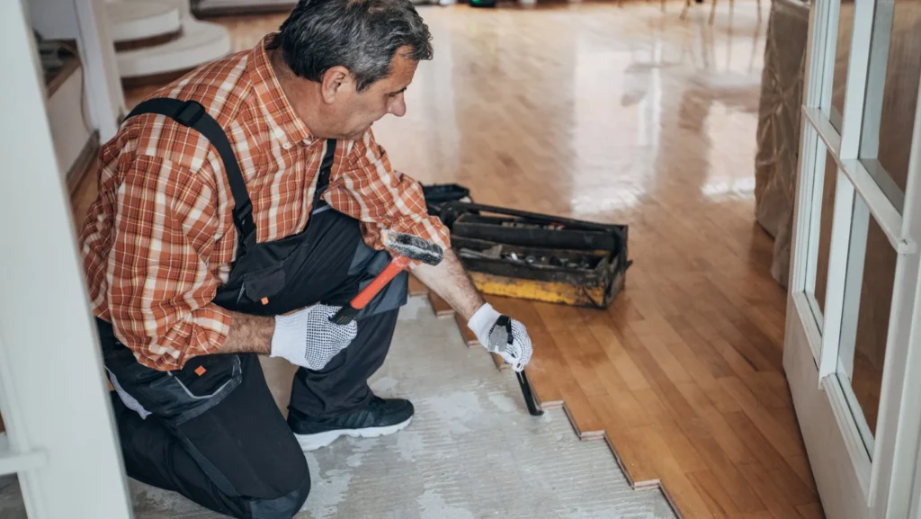 Carpet buying guide for Webster, NY bedrooms featuring carpet pile samples, padding options, and a cozy carpeted bedroom.